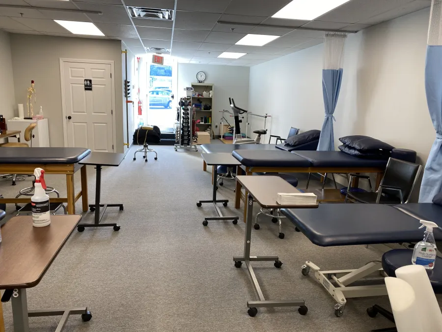 Treatment tables and equipment inside the Hingham clinic